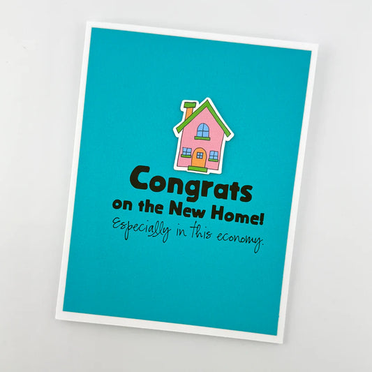 Greeting card with a house illustration and text on a blue background